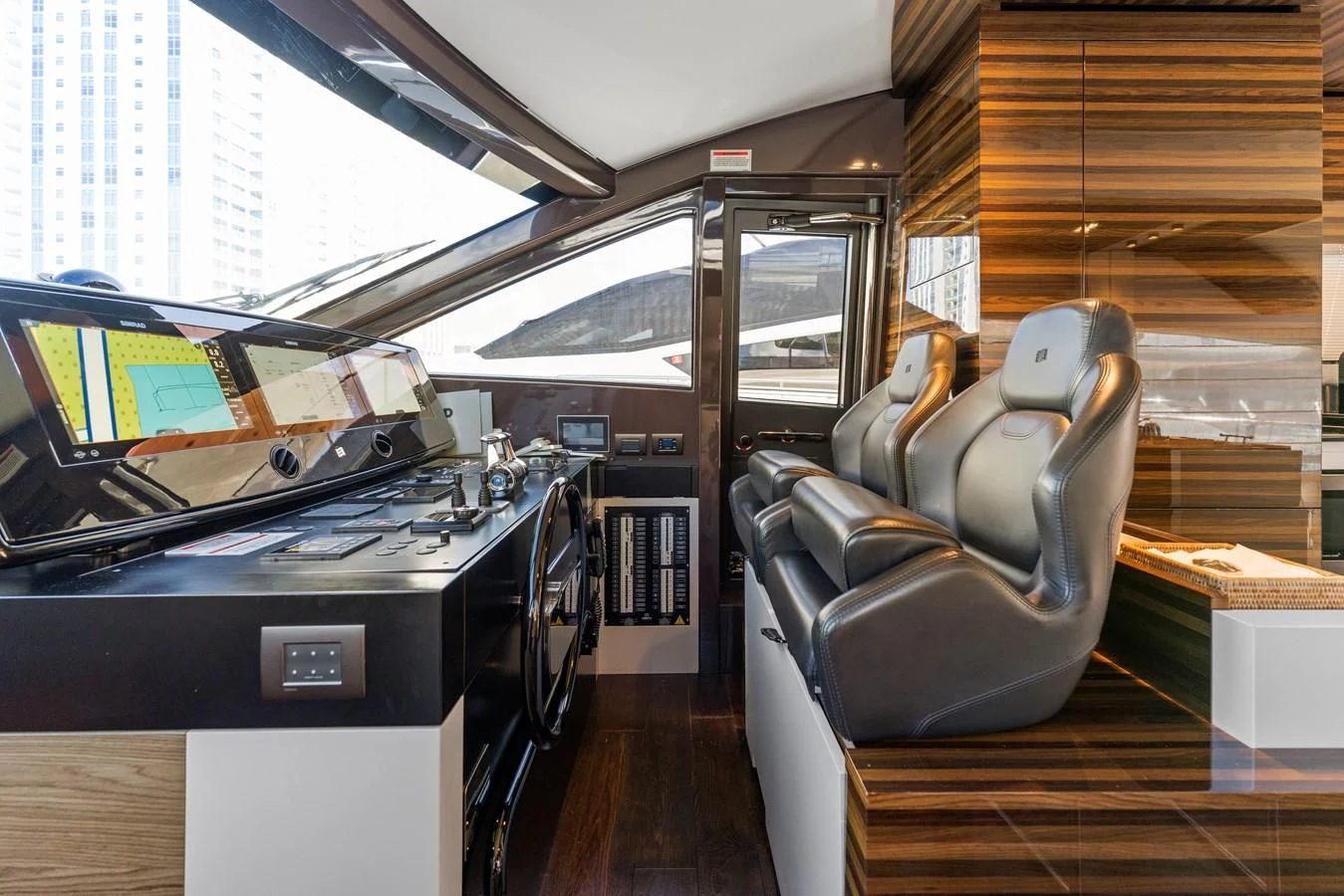 a room with a chair and a desk aboard LEGEND Yacht for Sale