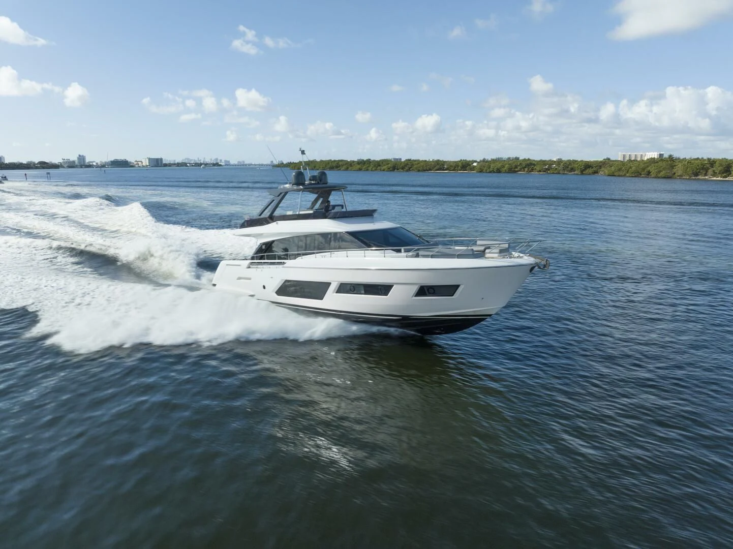 a white boat on water aboard LEGEND Yacht for Sale