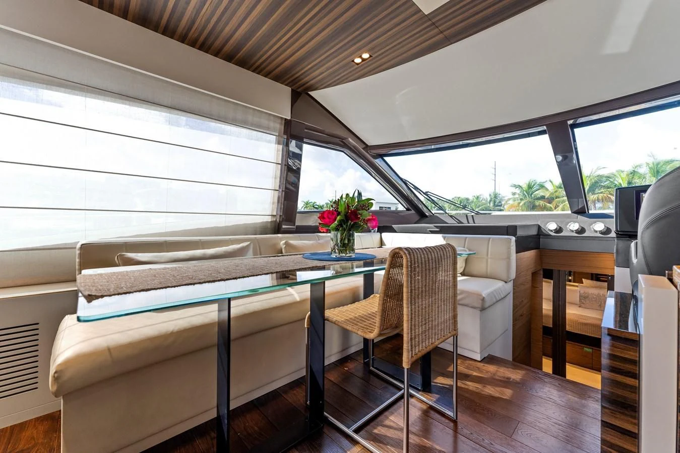 a table and chairs in a room aboard LEGEND Yacht for Sale