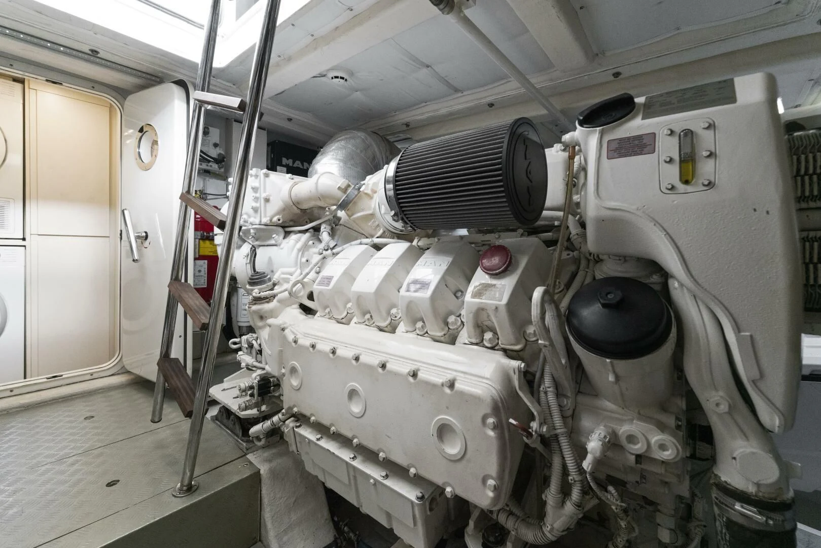 a large machine in a room aboard LEGEND Yacht for Sale
