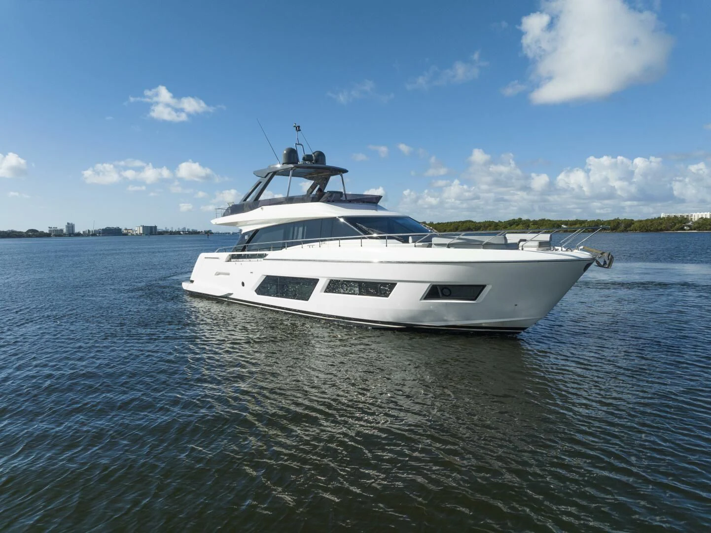 a white boat on water aboard LEGEND Yacht for Sale