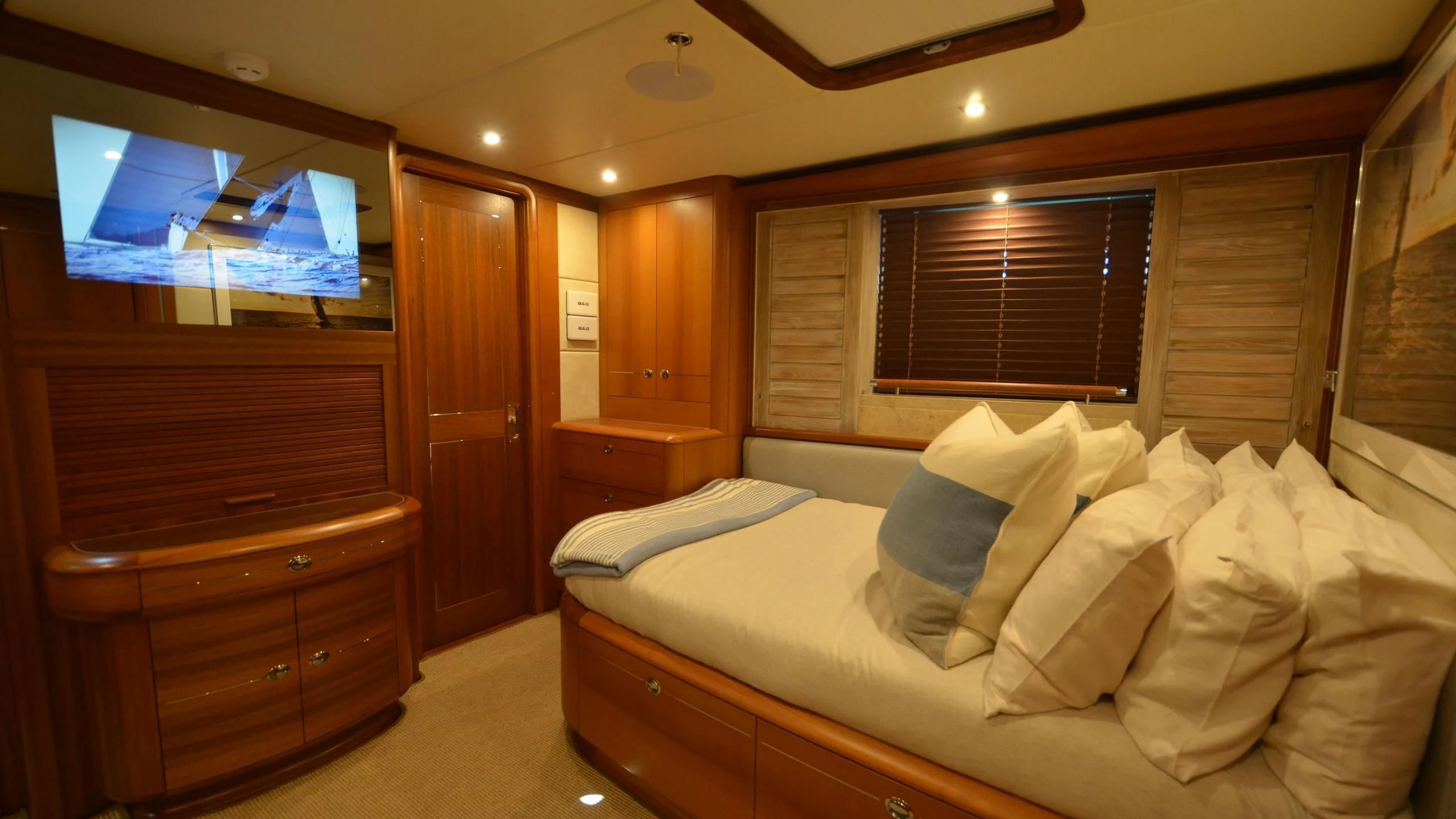 a bed in a room aboard DANNESKJOLD Yacht for Sale