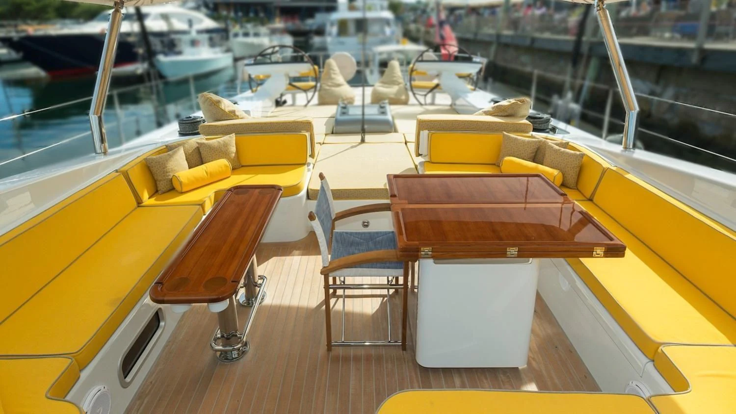 a boat with a table and chairs aboard DANNESKJOLD Yacht for Sale