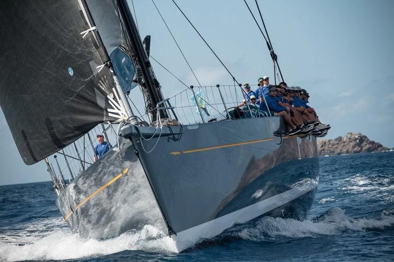 a group of people on a sailboat aboard DANNESKJOLD Yacht for Sale