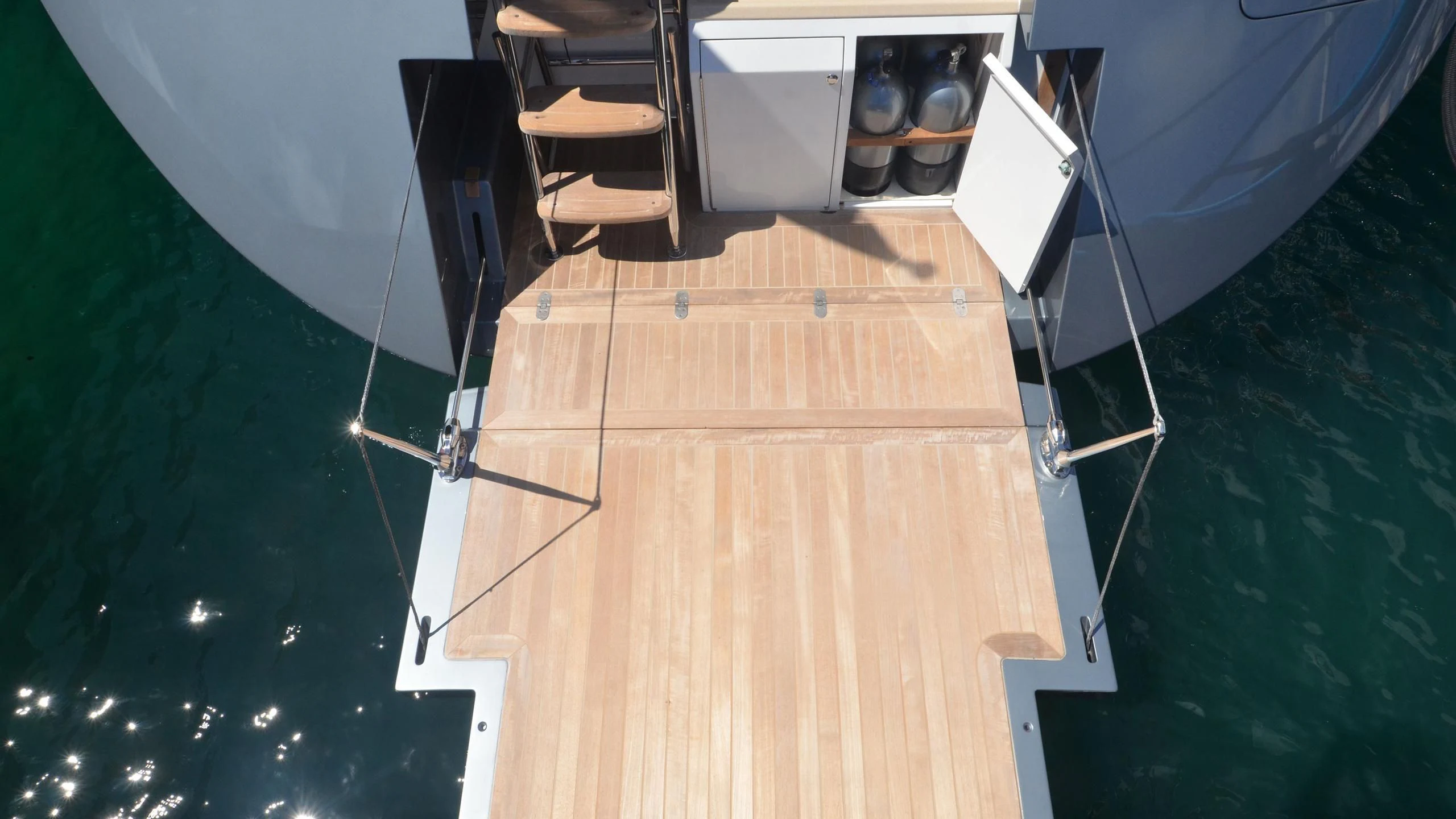 a wooden boat on a body of water aboard DANNESKJOLD Yacht for Sale