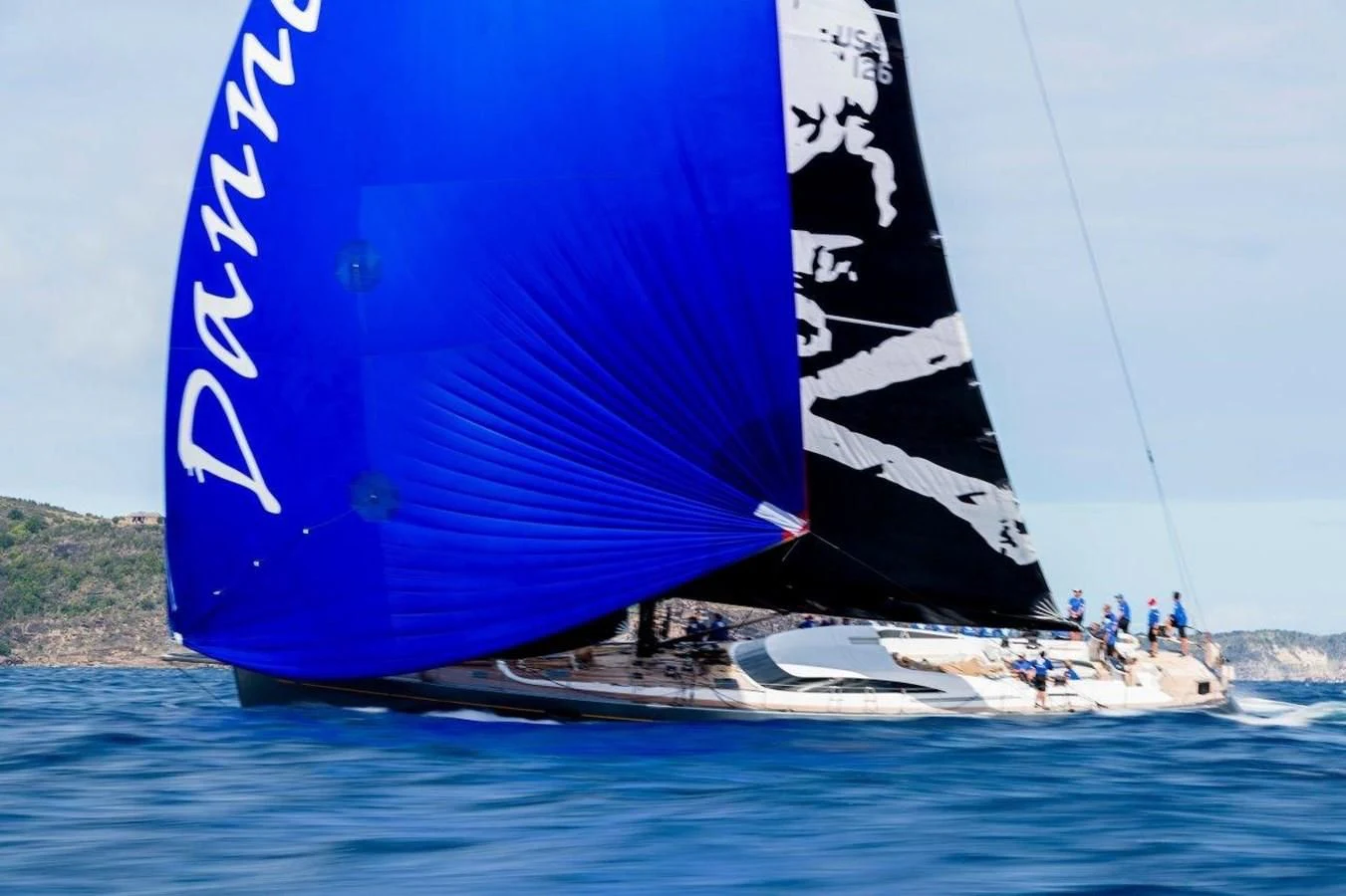 a group of people sailing on a sailboat aboard DANNESKJOLD Yacht for Sale
