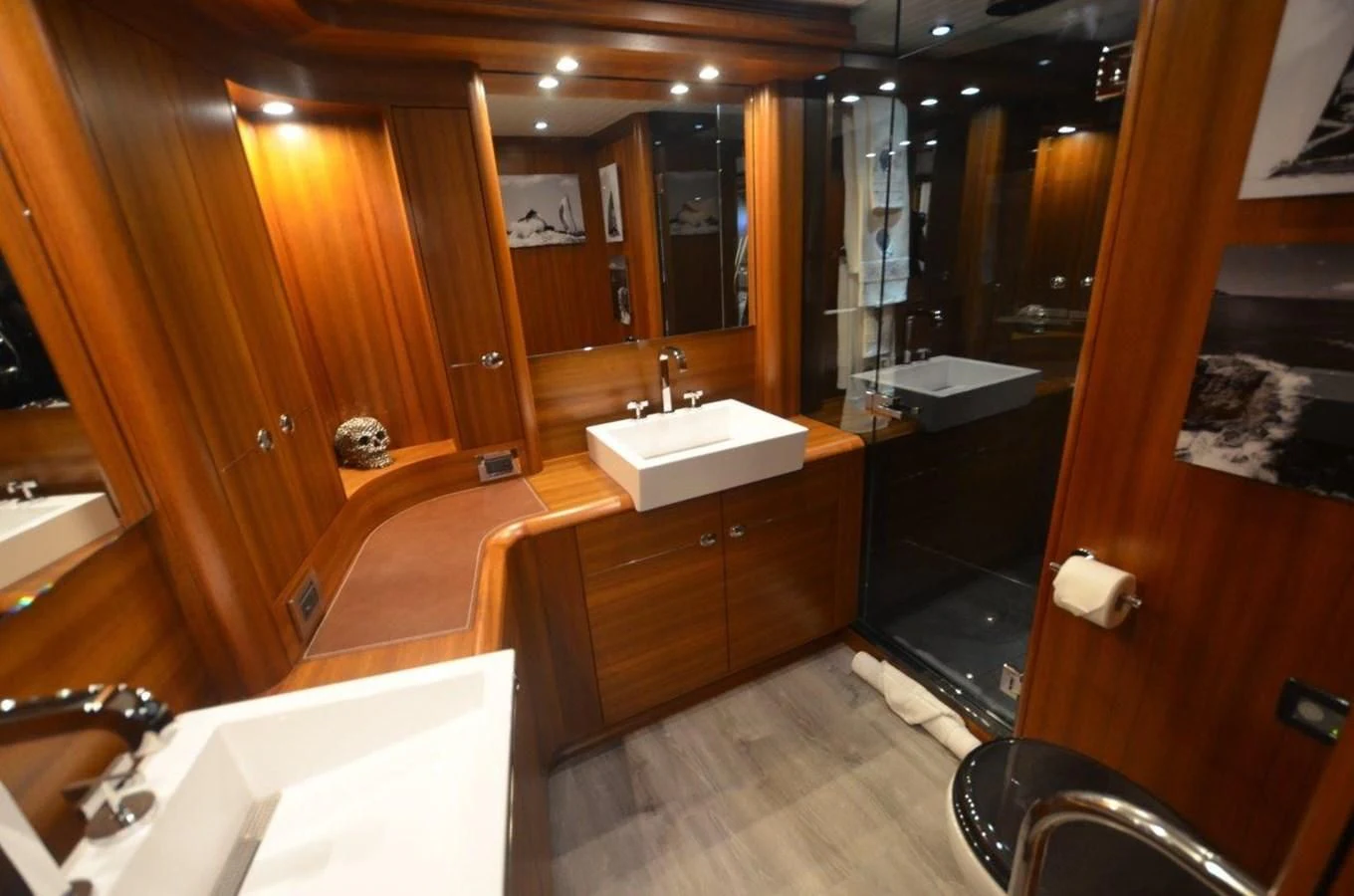 a bathroom with a large mirror aboard DANNESKJOLD Yacht for Sale