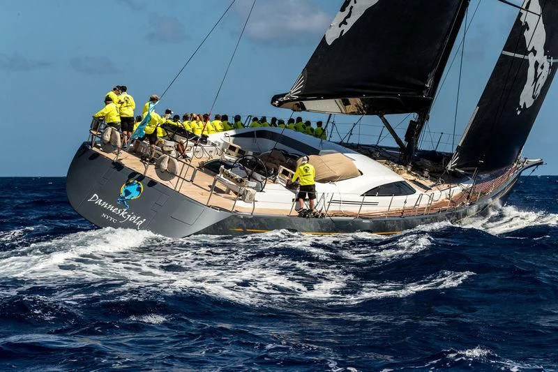 a boat with a few men on it aboard DANNESKJOLD Yacht for Sale