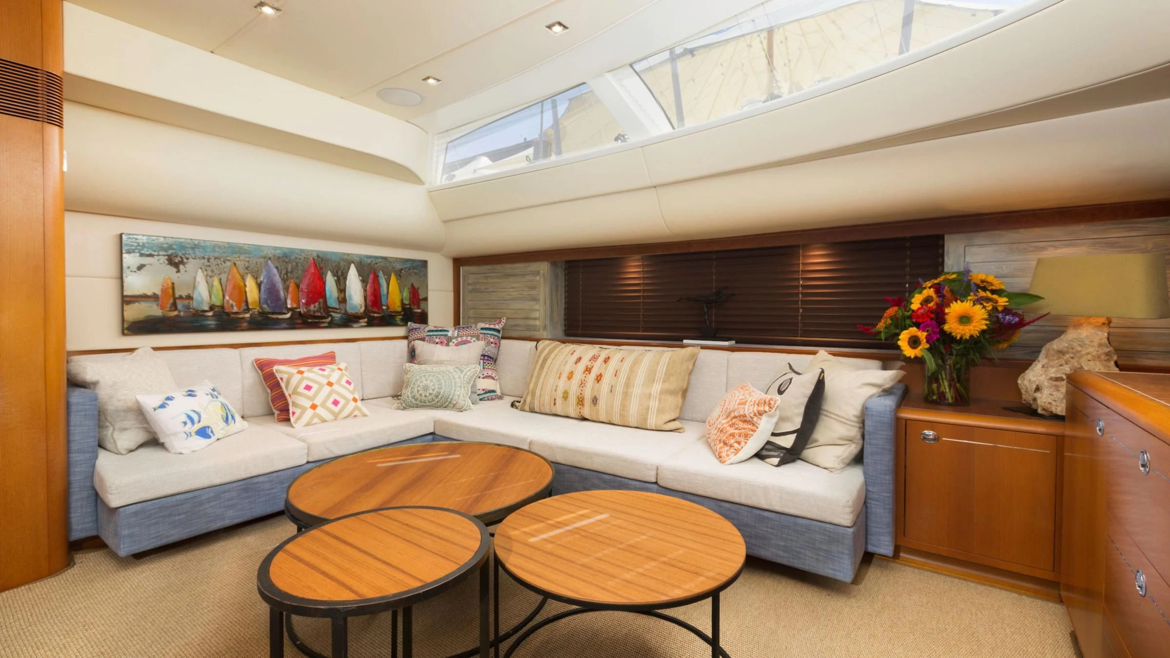 a bed and a table in a room aboard DANNESKJOLD Yacht for Sale
