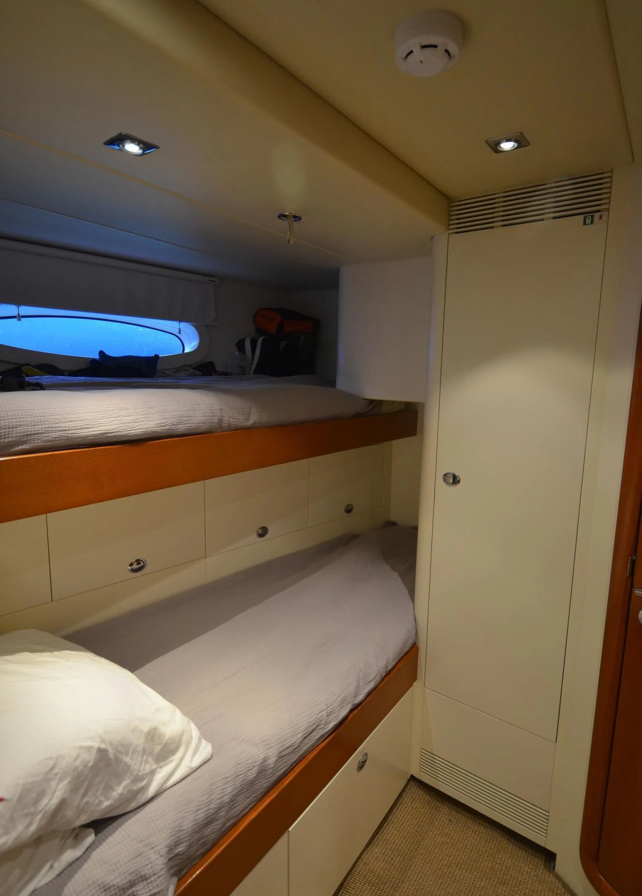 a room with a bed and a television aboard DANNESKJOLD Yacht for Sale