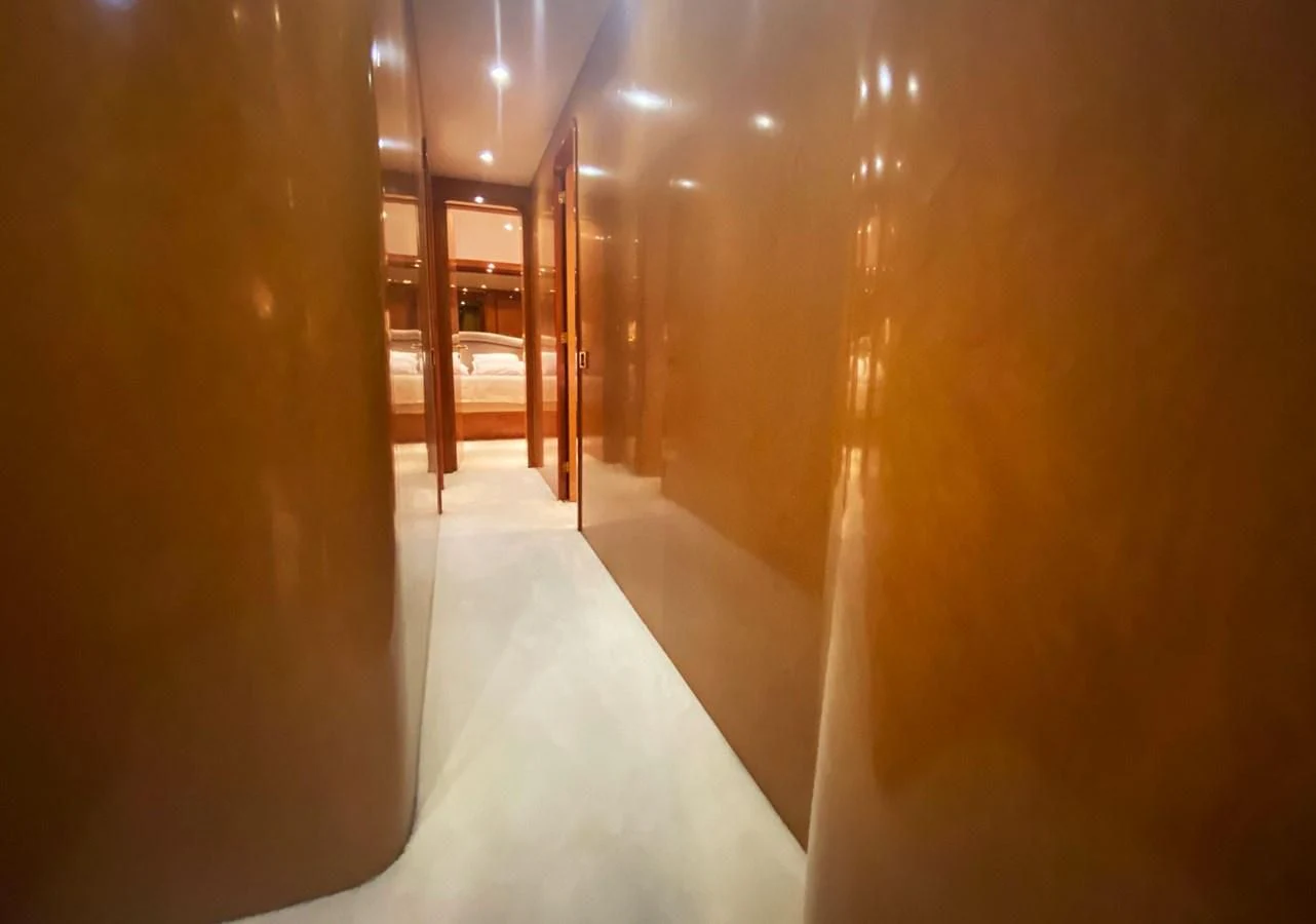 a hallway with a white floor aboard GRAN FINALE II Yacht for Sale