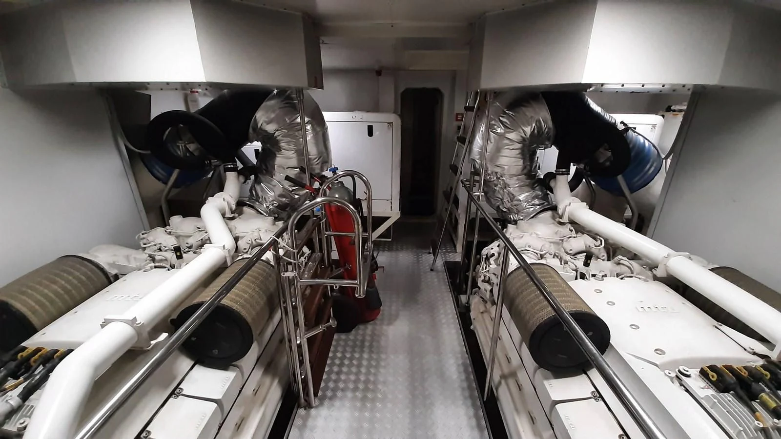 a room full of machinery aboard OKAMI Yacht for Sale