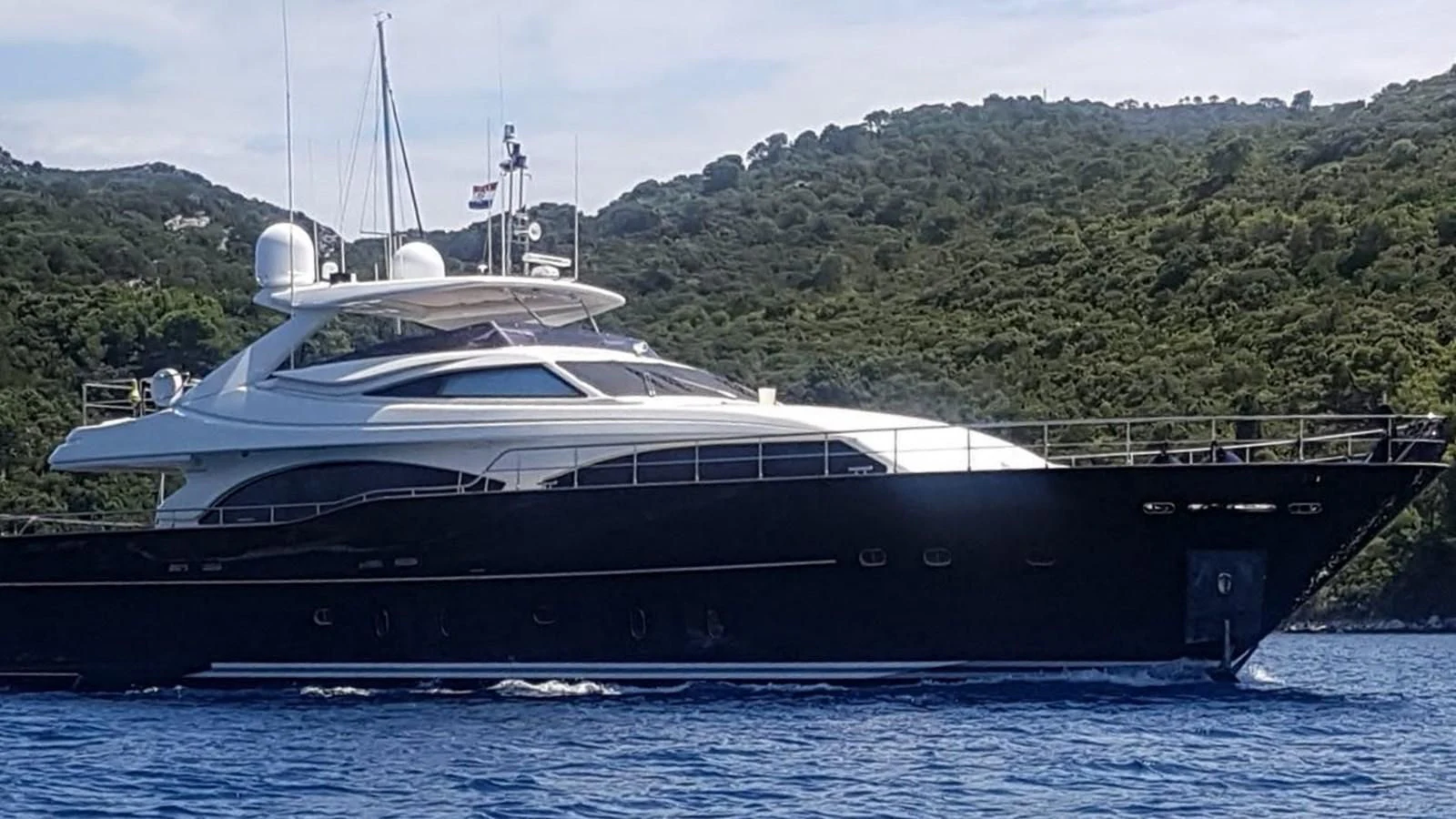 a boat in the water aboard OKAMI Yacht for Sale