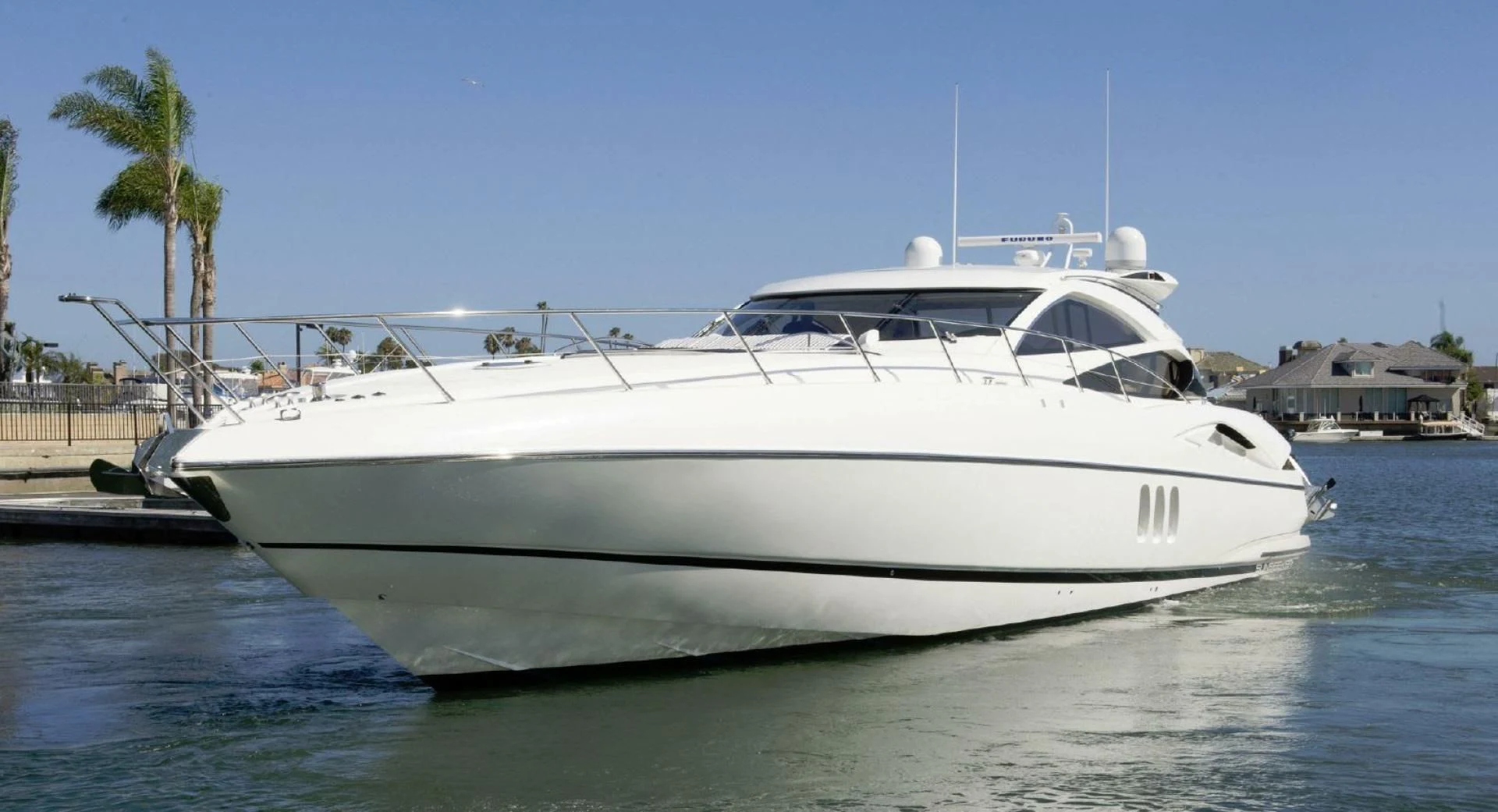 a white yacht in the water aboard SONSEEKER Yacht for Sale