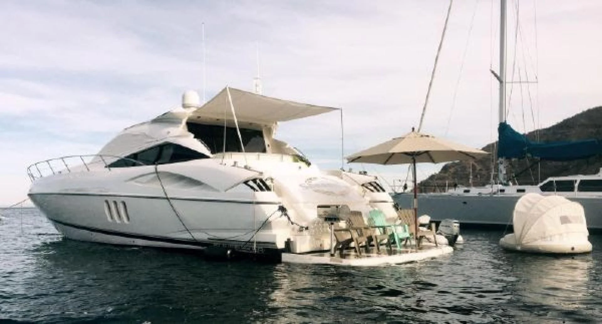 a group of boats sit in the water aboard SONSEEKER Yacht for Sale