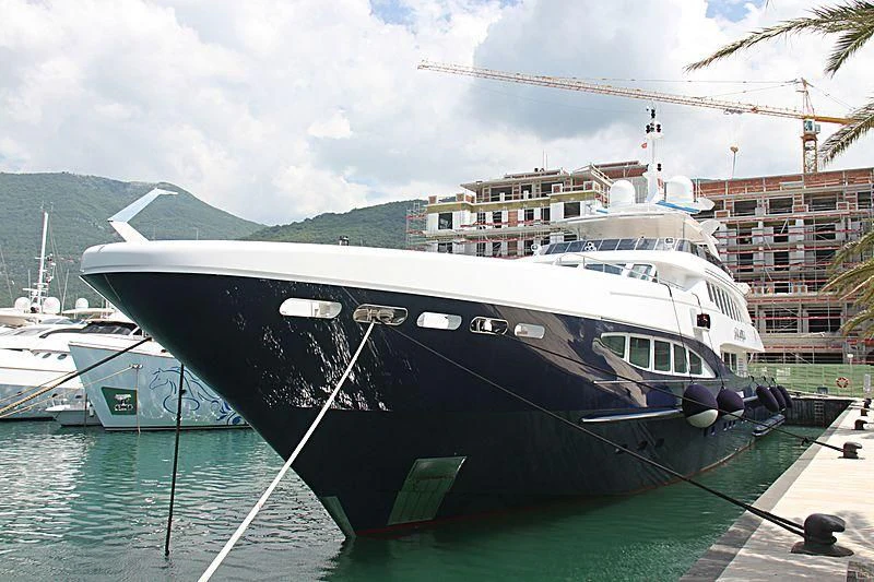 a boat docked at a pier aboard RED SAPPHIRE Yacht for Sale
