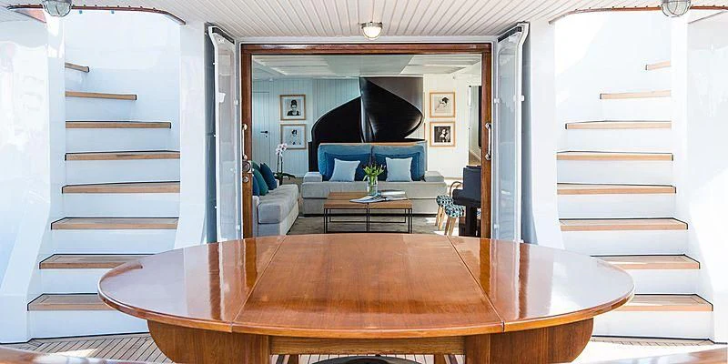 a living room with a large tv aboard MENORCA Yacht for Sale