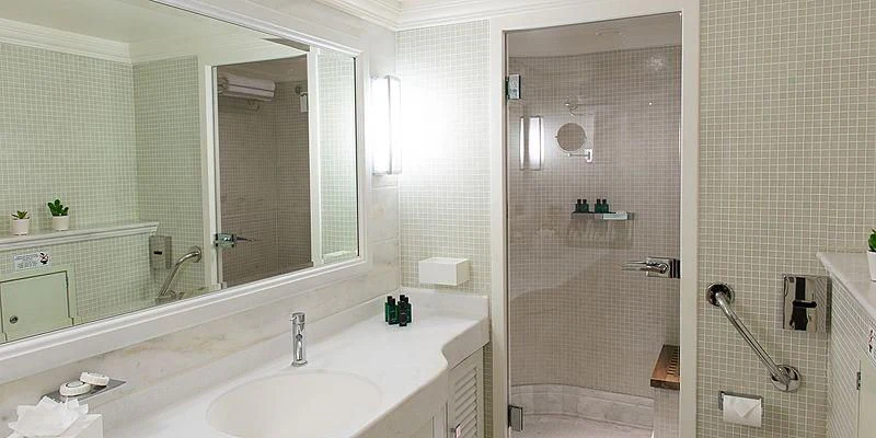 a bathroom with a glass shower aboard MENORCA Yacht for Sale