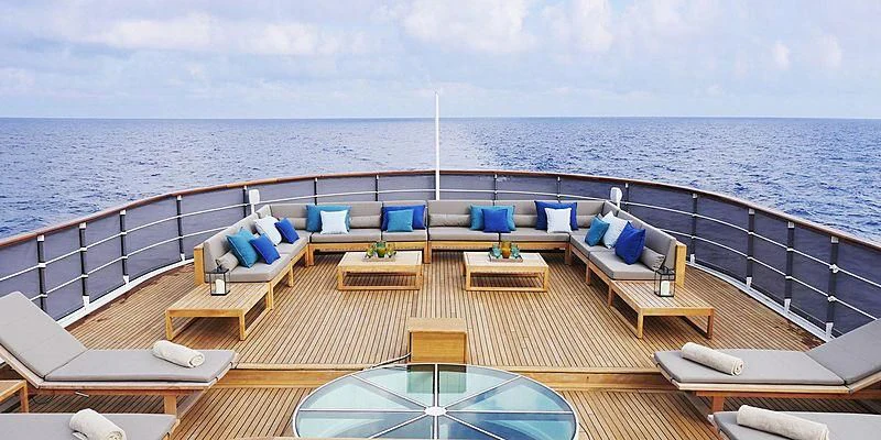 a deck with a view of the ocean and the ocean aboard MENORCA Yacht for Sale