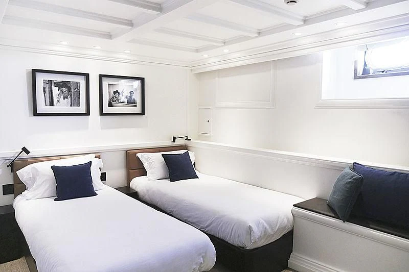 a couple of beds in a room aboard MENORCA Yacht for Sale