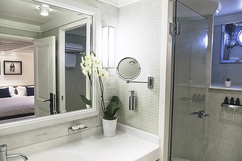 a bathroom with a large mirror aboard MENORCA Yacht for Sale