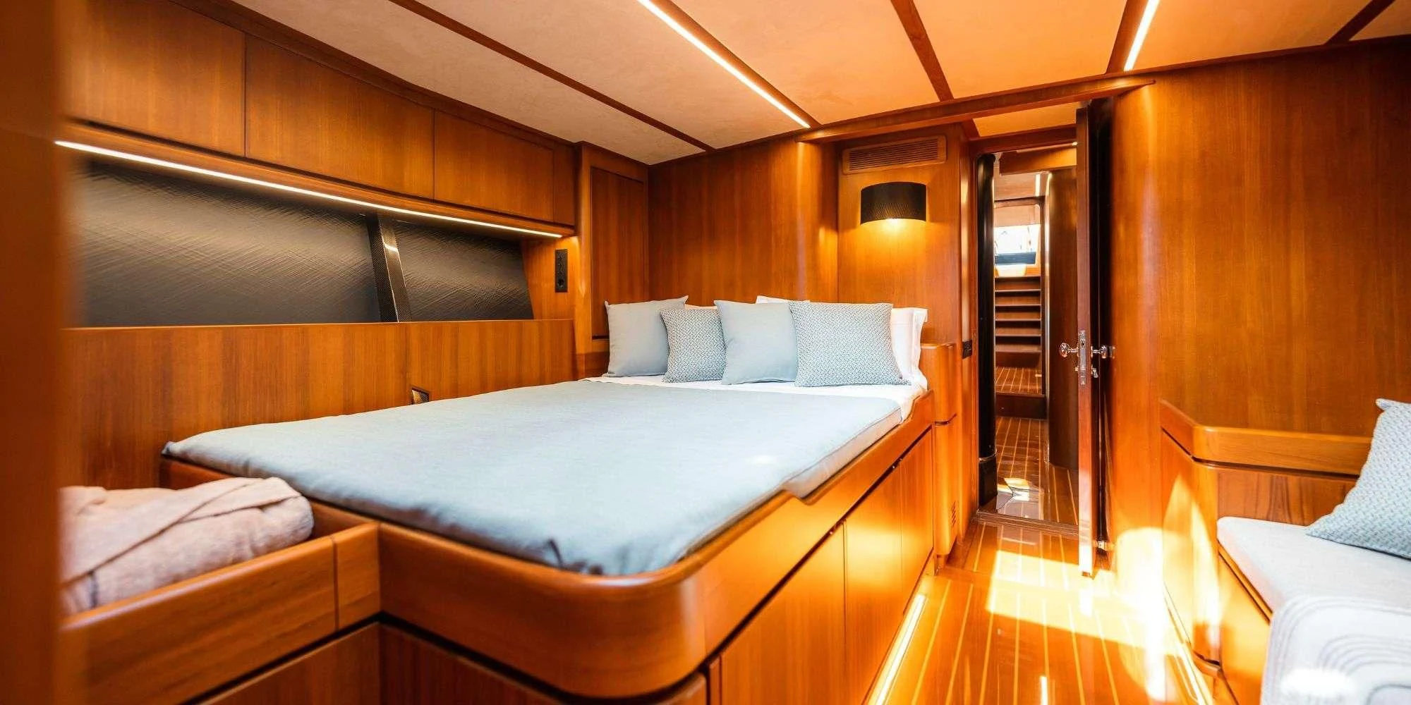 a room with a bed and a door aboard WALLY ONE Yacht for Sale