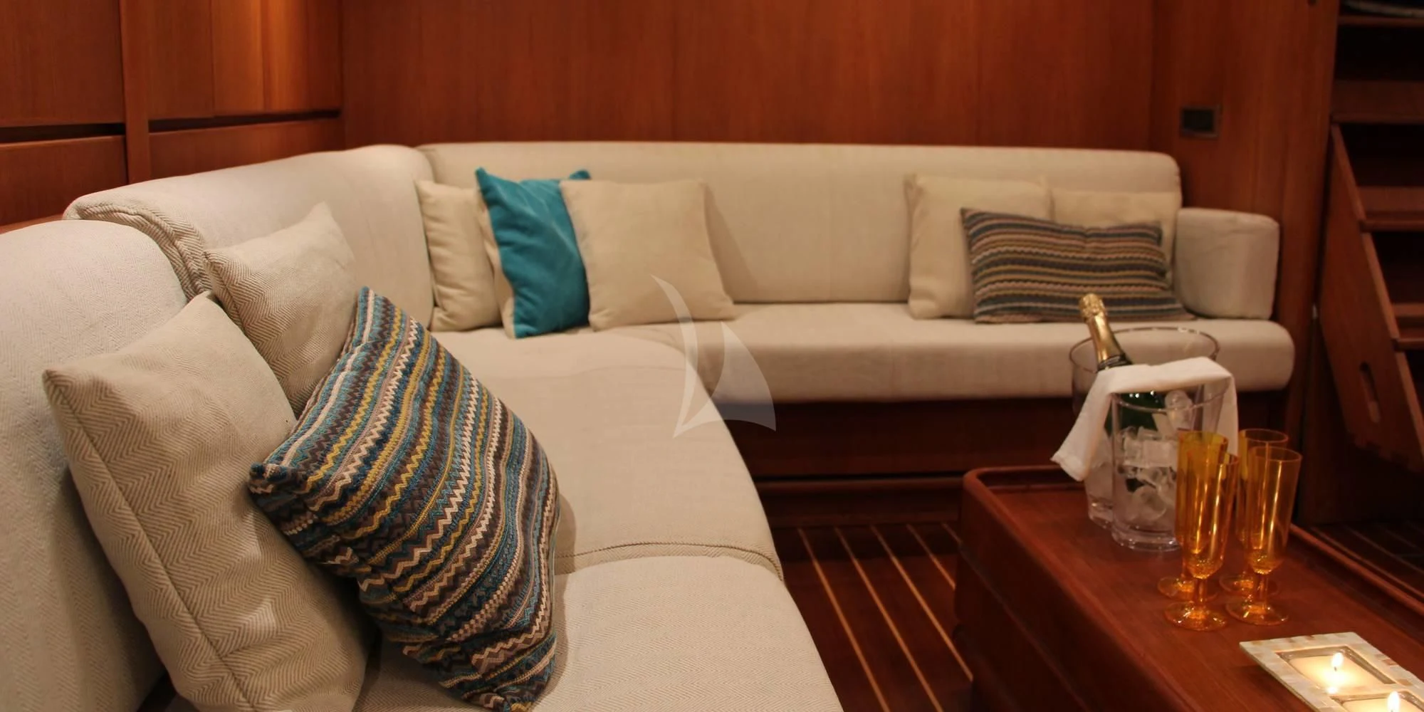 a couch with pillows and pillows aboard WALLY ONE Yacht for Sale