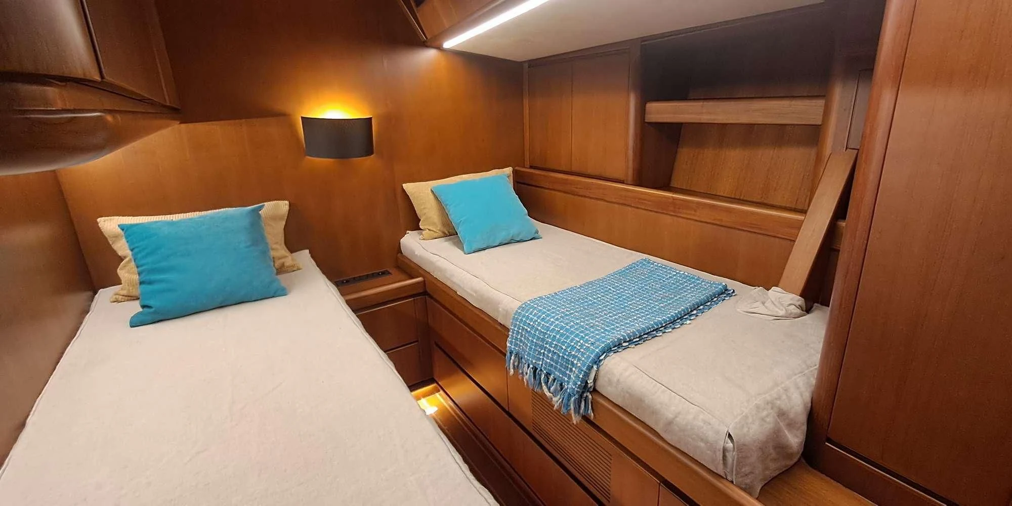 a couple of beds in a room aboard WALLY ONE Yacht for Sale