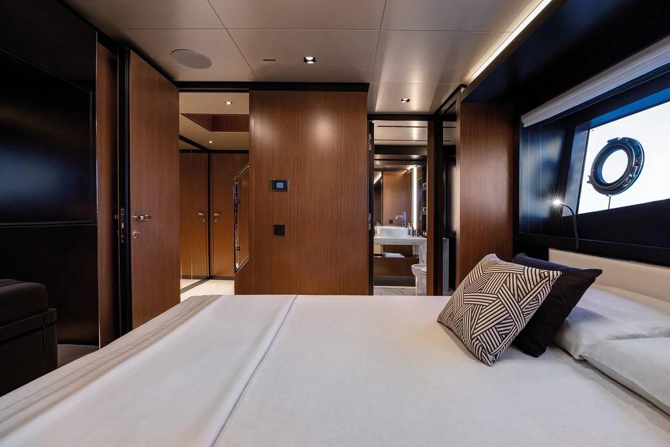 a bed with pillows on it aboard ALEGRA Yacht for Sale