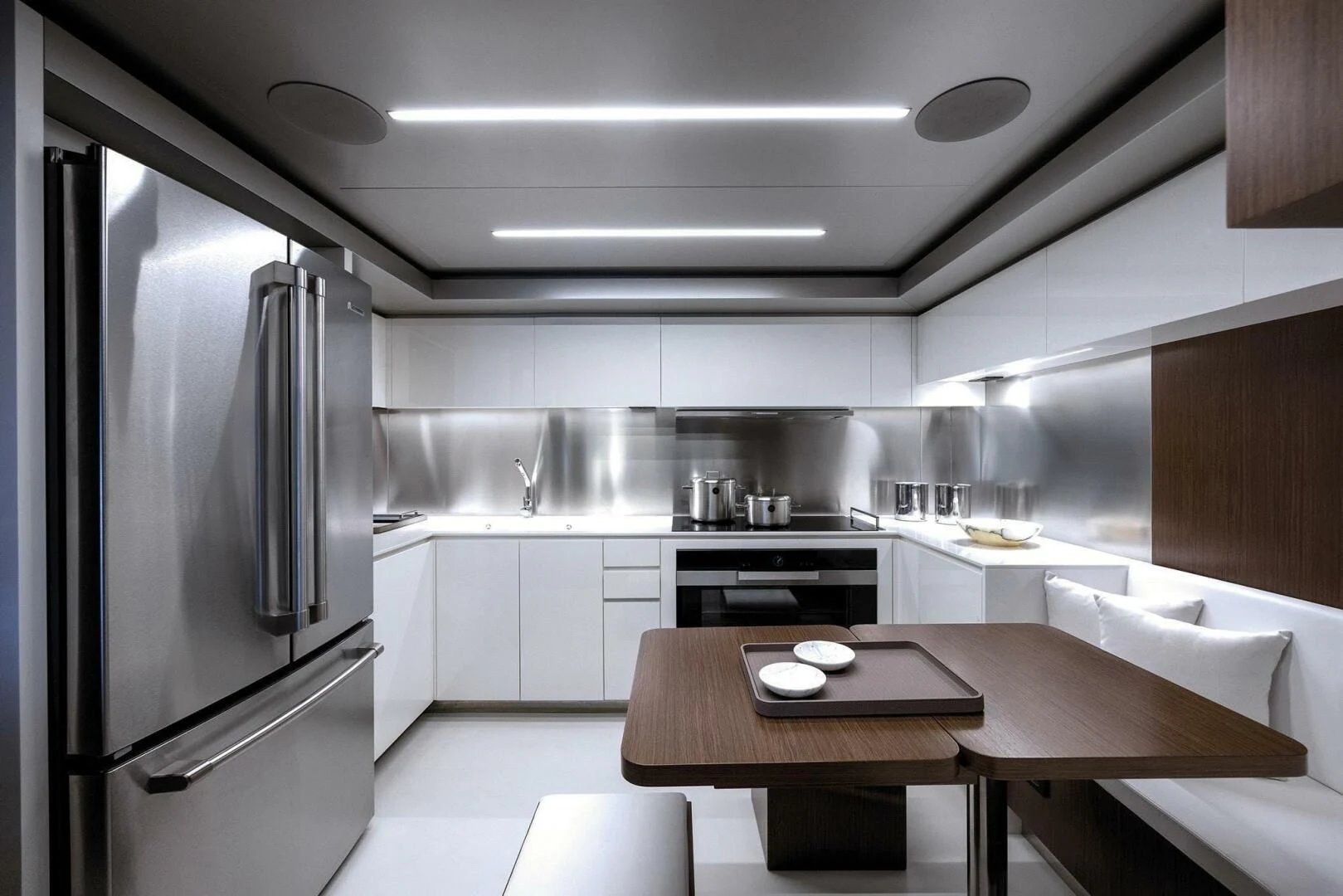 a kitchen with a stainless steel refrigerator aboard ALEGRA Yacht for Sale