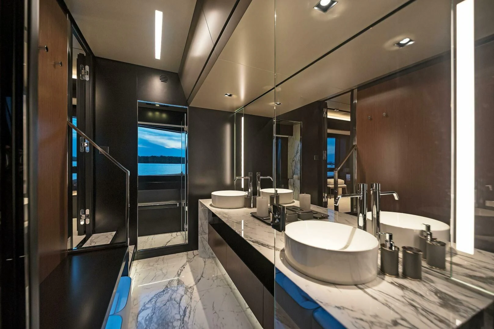 a bathroom with sinks and mirrors aboard ALEGRA Yacht for Sale