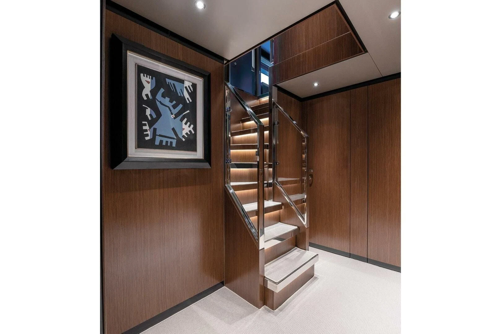 a wooden staircase in a room aboard ALEGRA Yacht for Sale