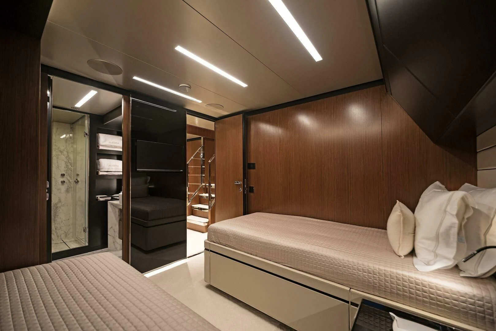 a room with a bed and a staircase aboard ALEGRA Yacht for Sale