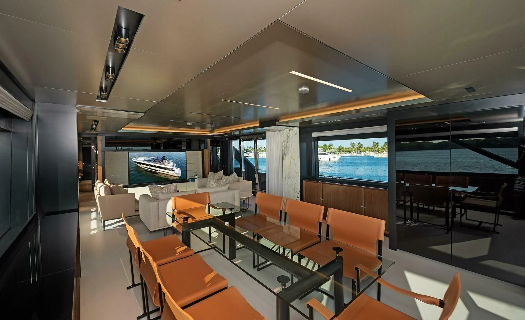a room with tables and chairs aboard ALEGRA Yacht for Sale