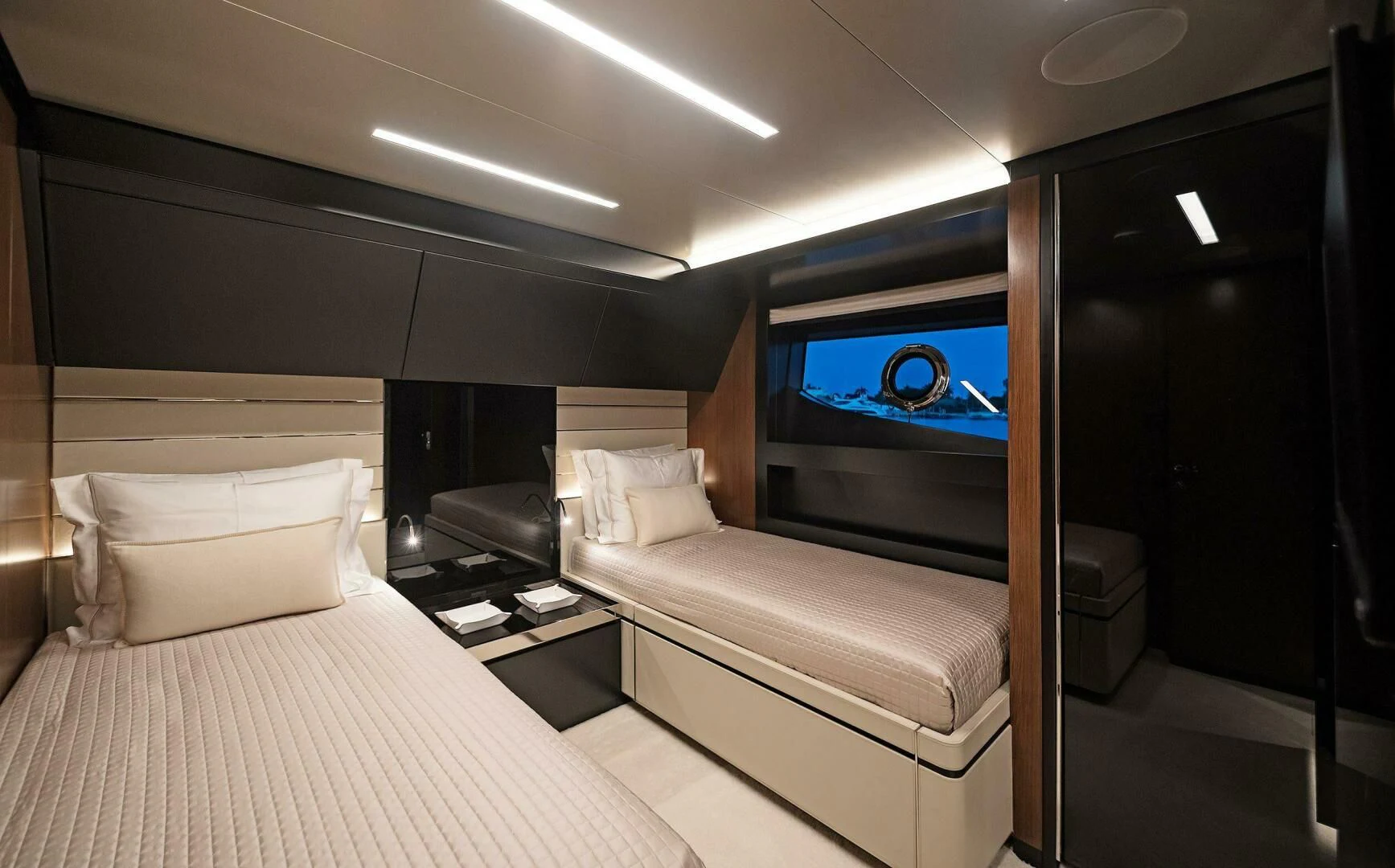 a room with a bed and a television aboard ALEGRA Yacht for Sale
