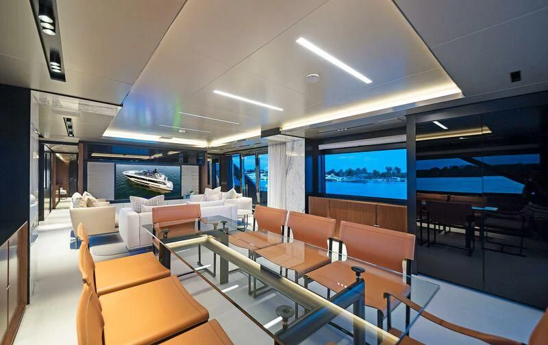 a room with tables and chairs aboard ALEGRA Yacht for Sale