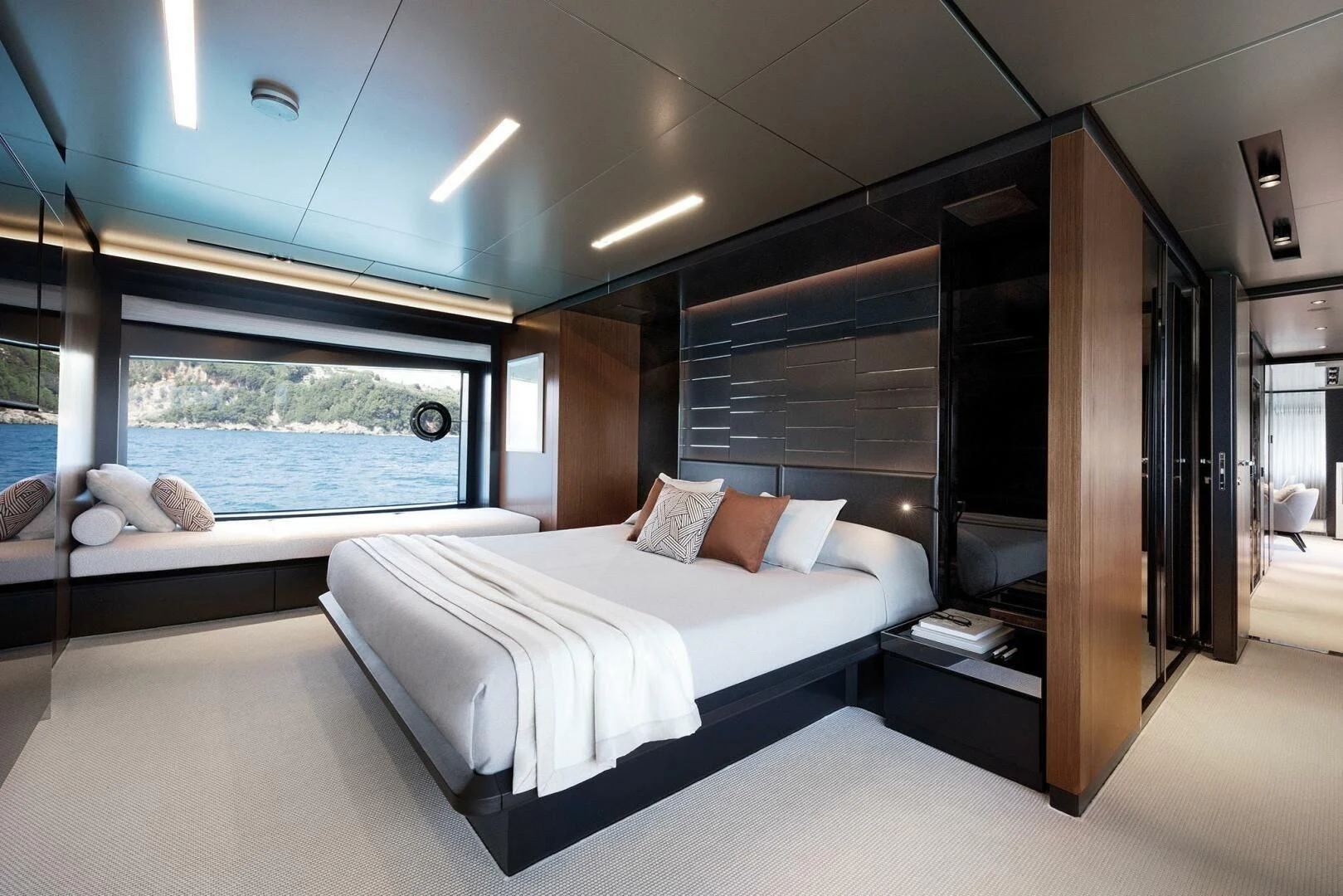 a room with a bed and a window aboard ALEGRA Yacht for Sale