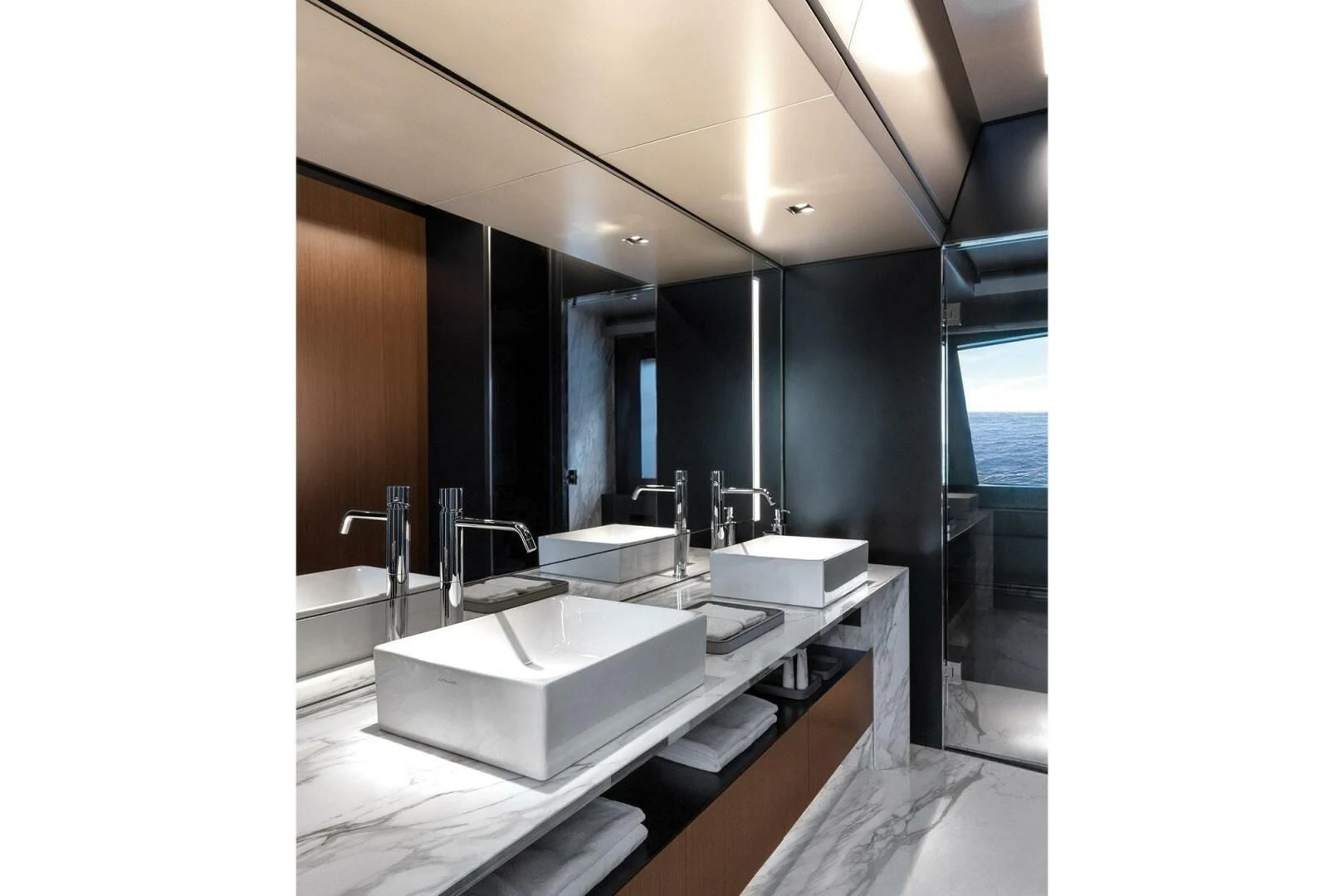 a bathroom with a large mirror aboard ALEGRA Yacht for Sale