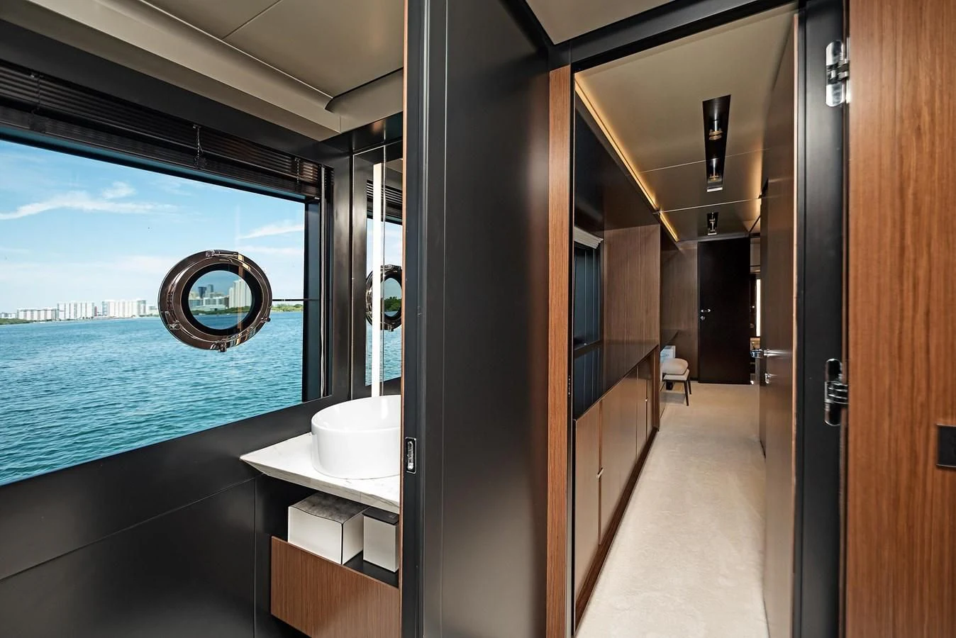 a bathroom with a large blue swimming pool aboard ALEGRA Yacht for Sale