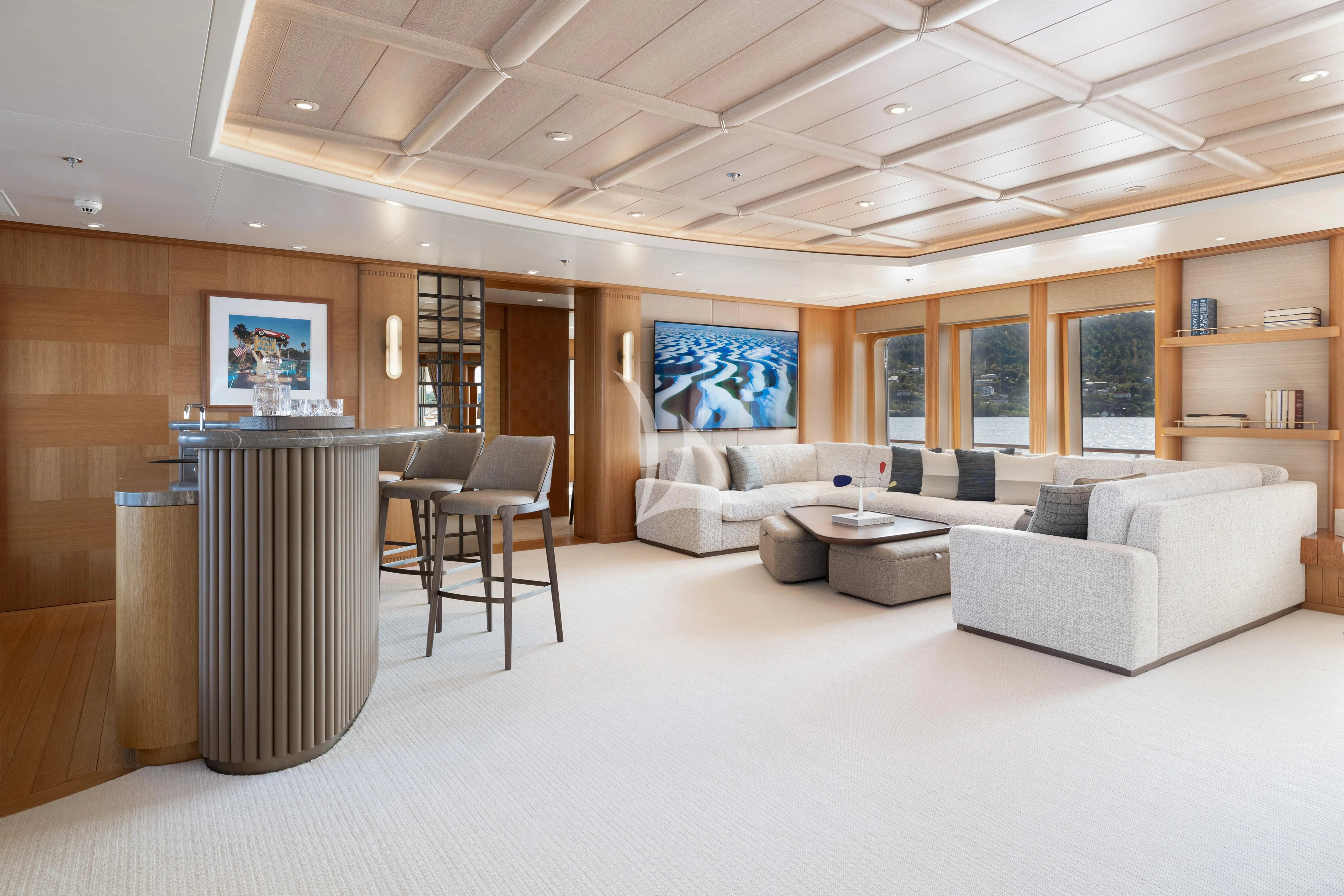 a large living room with a large window aboard NECTAR Yacht for Sale