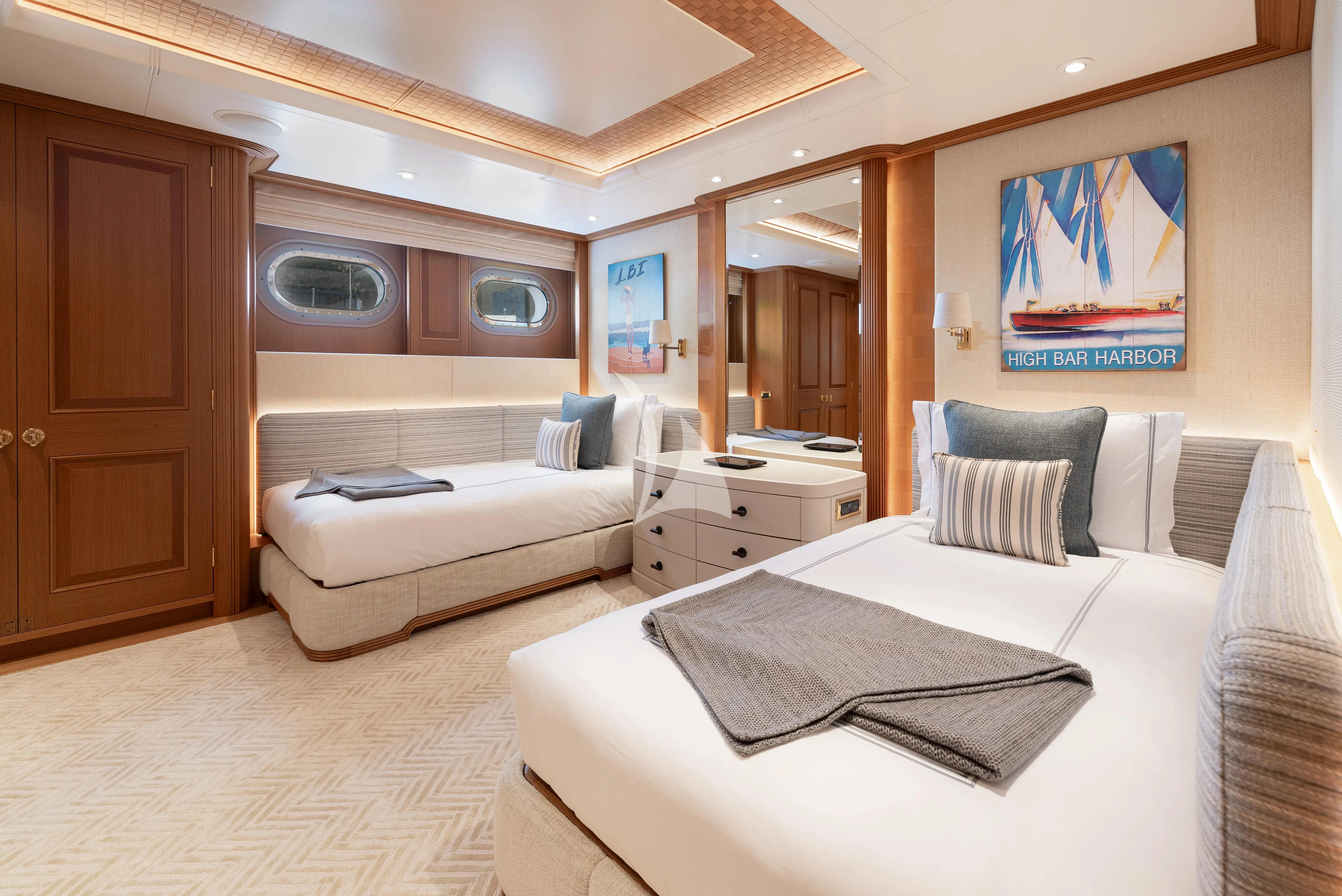 a room with a bed and a couch aboard NECTAR Yacht for Sale