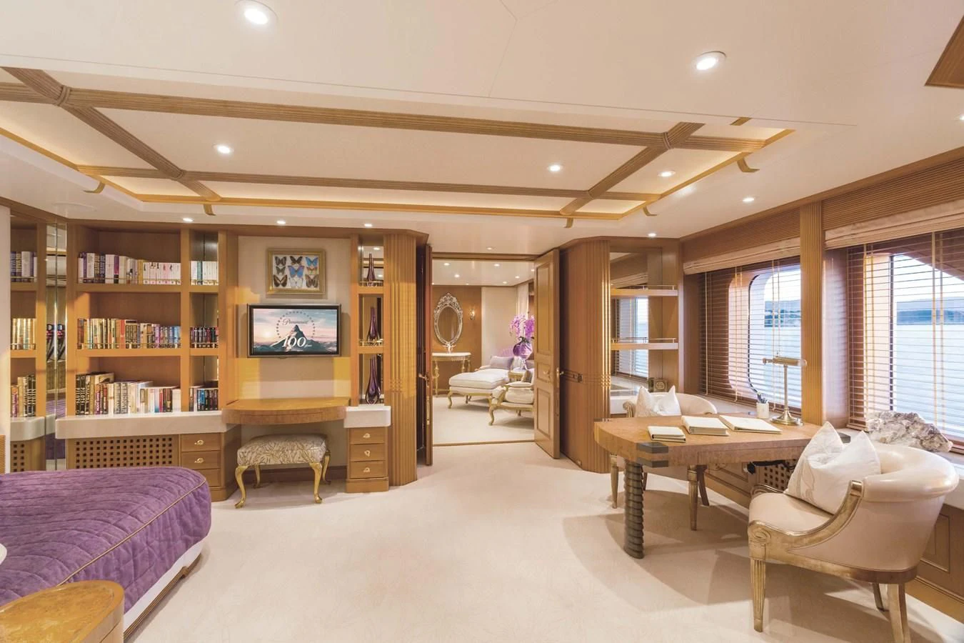 a room with a bed and a tv aboard NECTAR Yacht for Sale