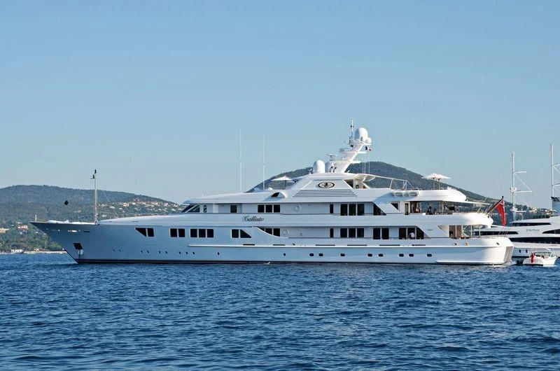 a large white boat in the water aboard NECTAR Yacht for Sale