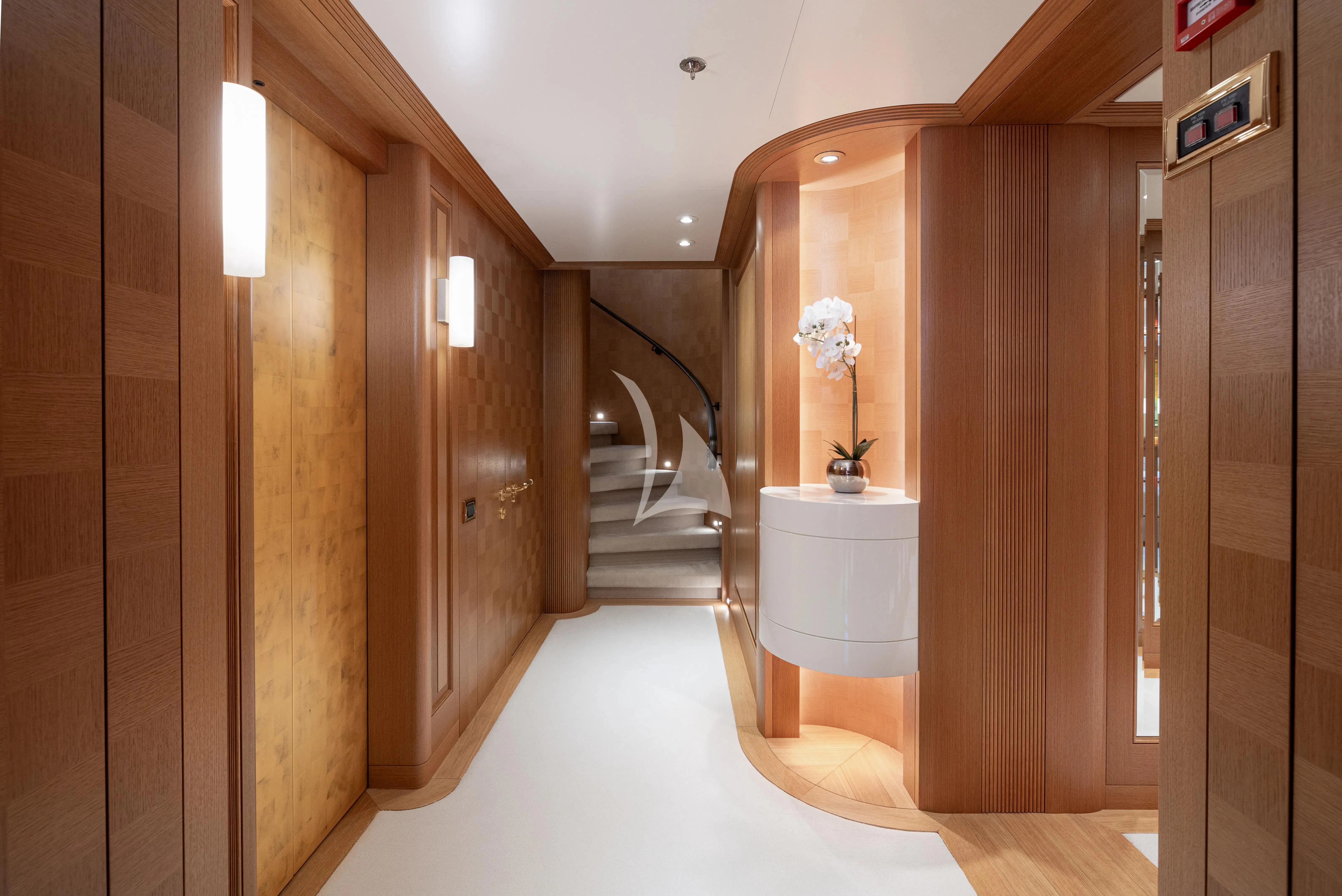 a hallway with a glass door aboard NECTAR Yacht for Sale