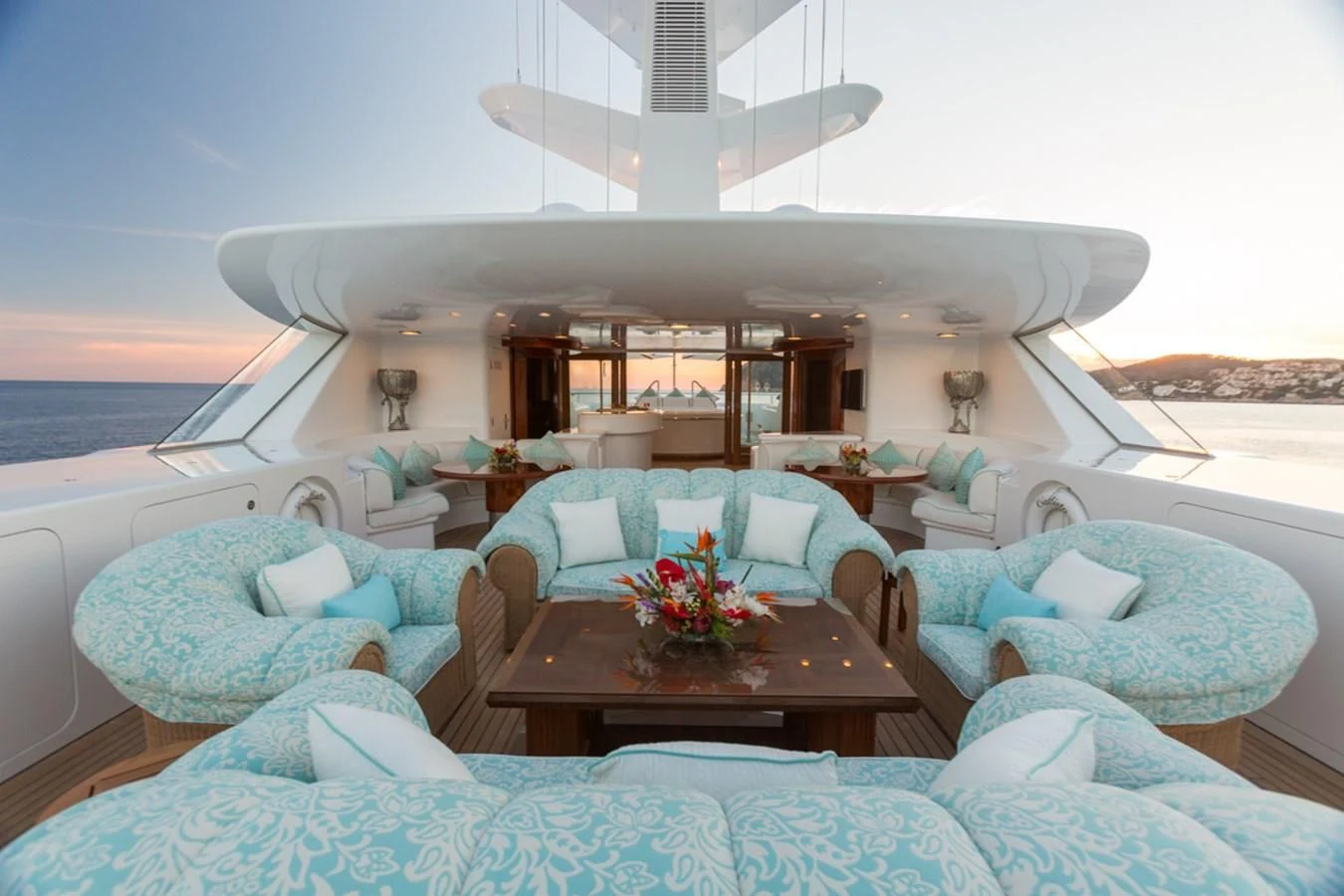 a boat with a table and chairs aboard NECTAR Yacht for Sale