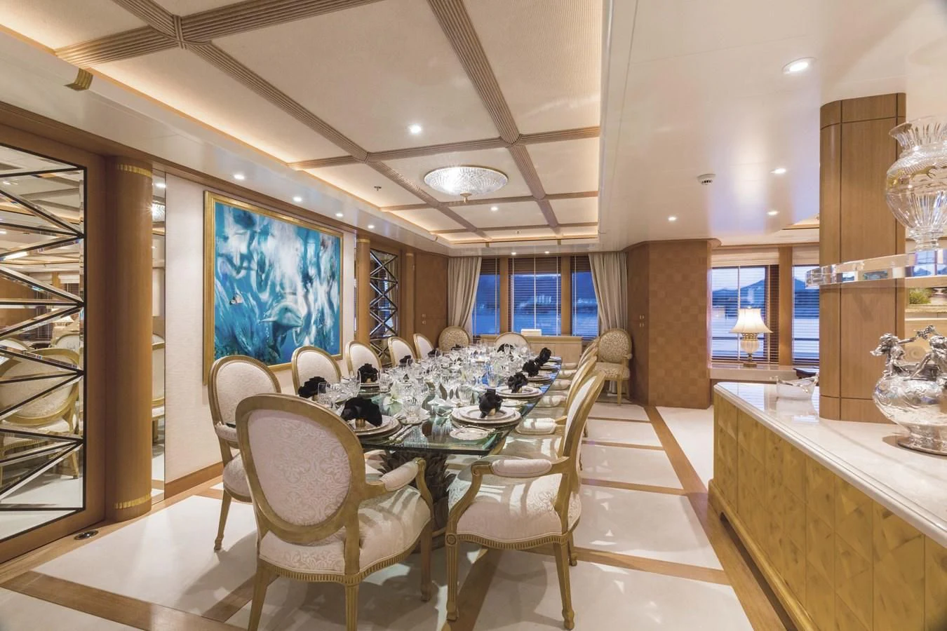 a dining room with a table and chairs aboard NECTAR Yacht for Sale