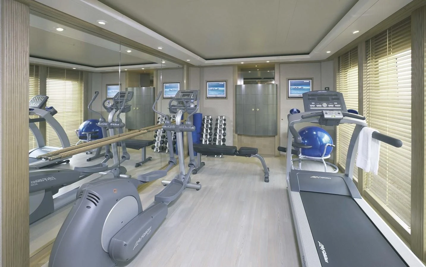 a room with exercise equipment aboard NECTAR Yacht for Sale