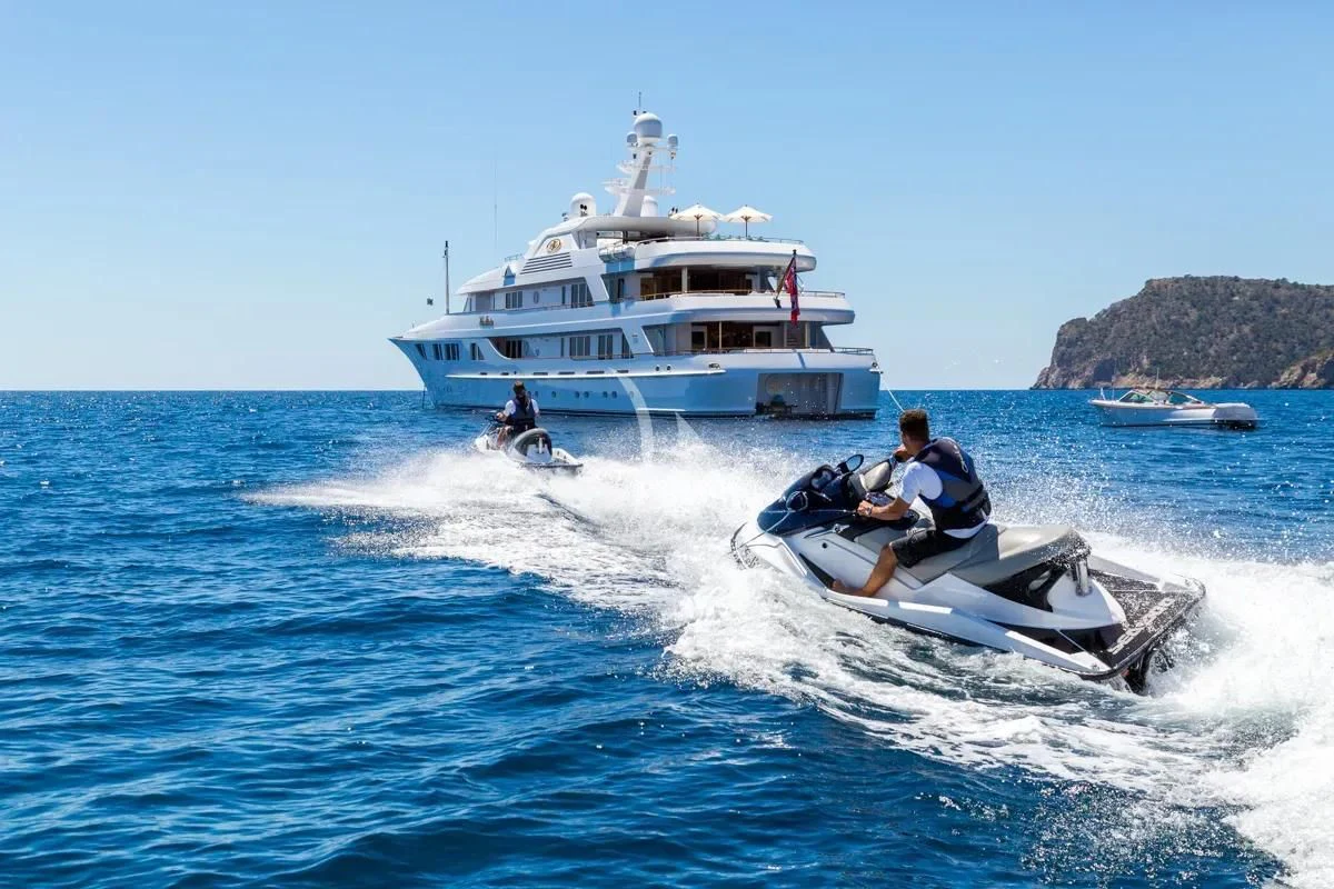 a boat with a motor boat on it aboard NECTAR Yacht for Sale