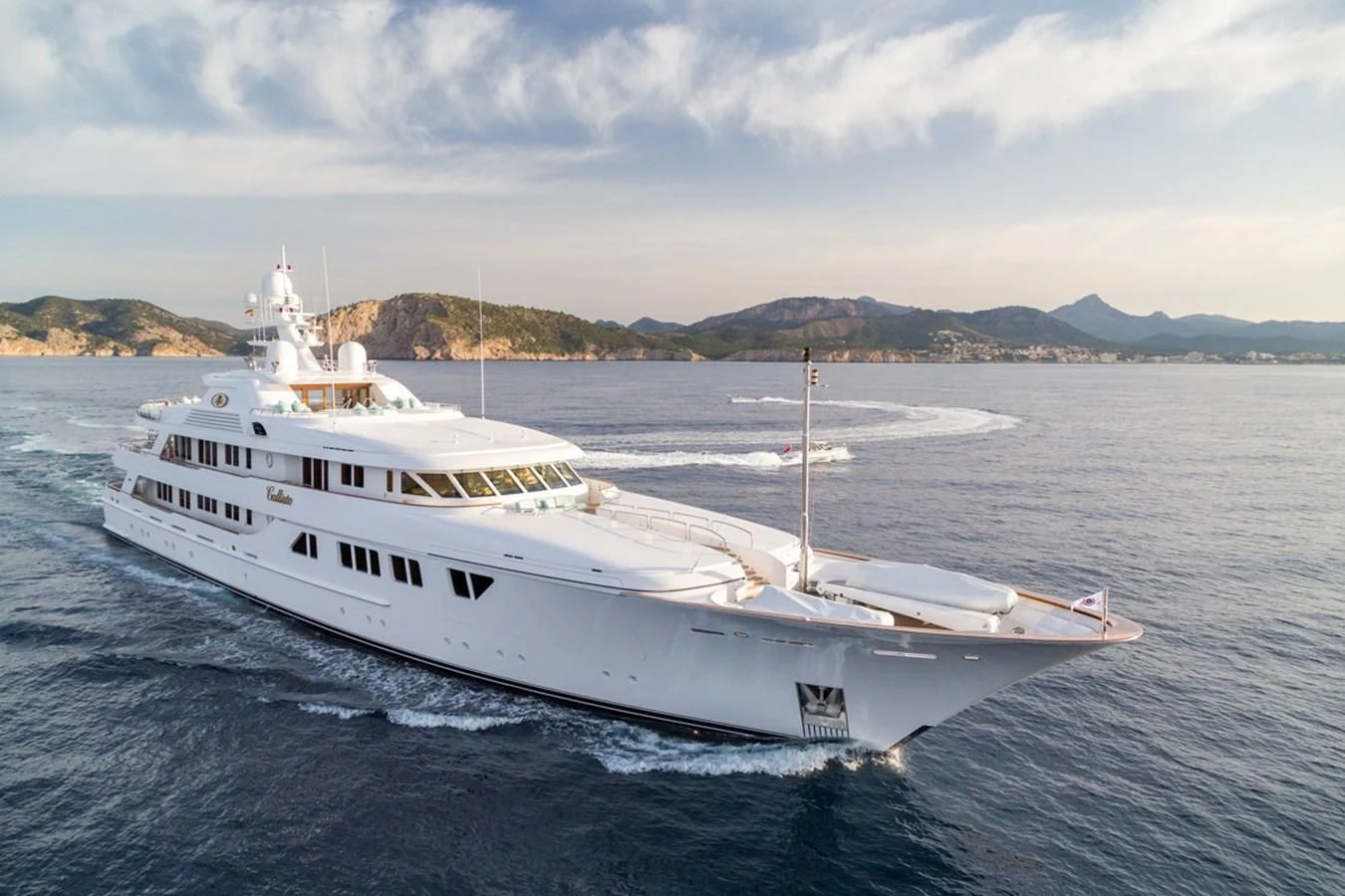 a white yacht in the water aboard NECTAR Yacht for Sale