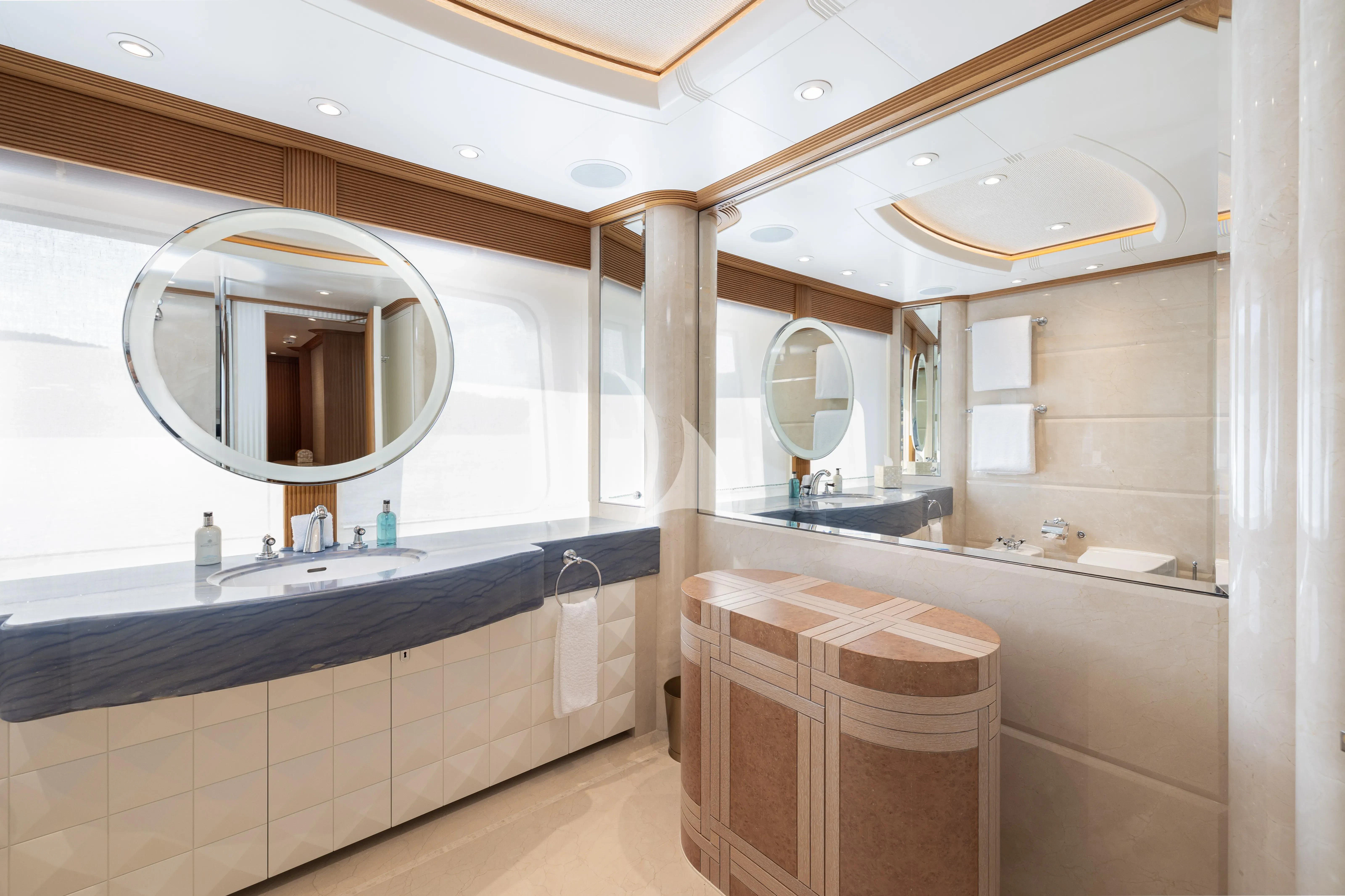 a bathroom with a large mirror aboard NECTAR Yacht for Sale